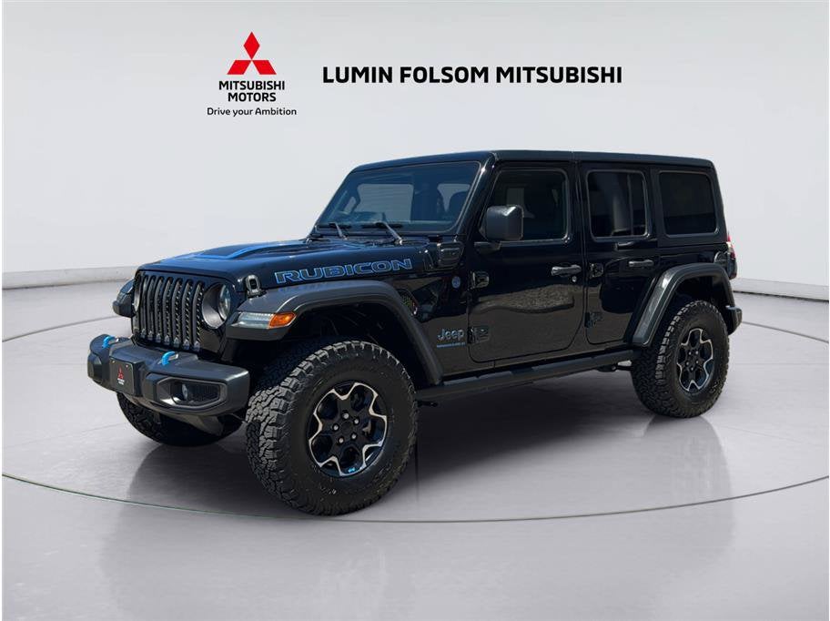 2023 Jeep Wrangler 4xe Rubicon in Black Clearcoat — front three-quarter view