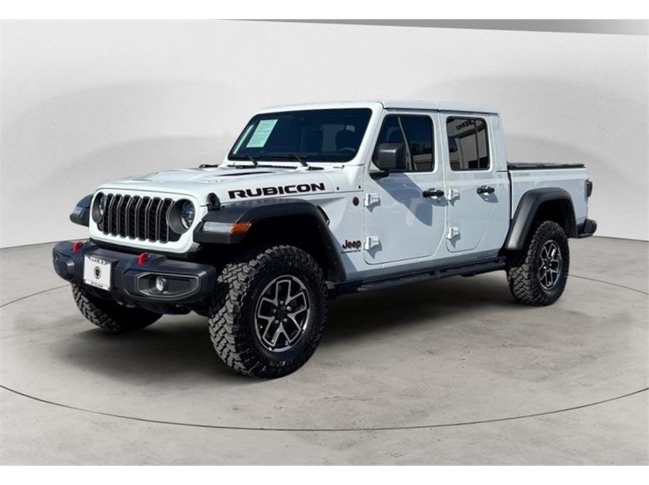 2025 Jeep Gladiator Rubicon in Bright White Clearcoat — front three-quarter view