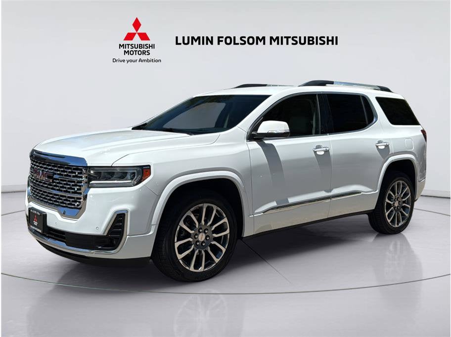 2023 GMC Acadia Denali in Summit White — front three-quarter view