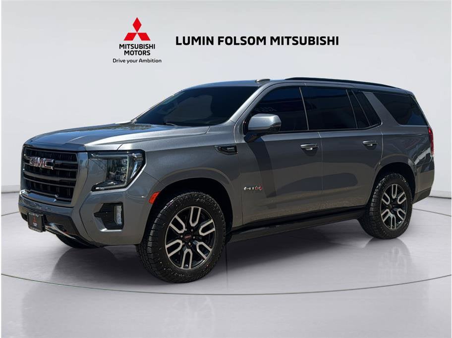 2021 GMC Yukon AT4 in Satin Steel Metallic — front three-quarter view