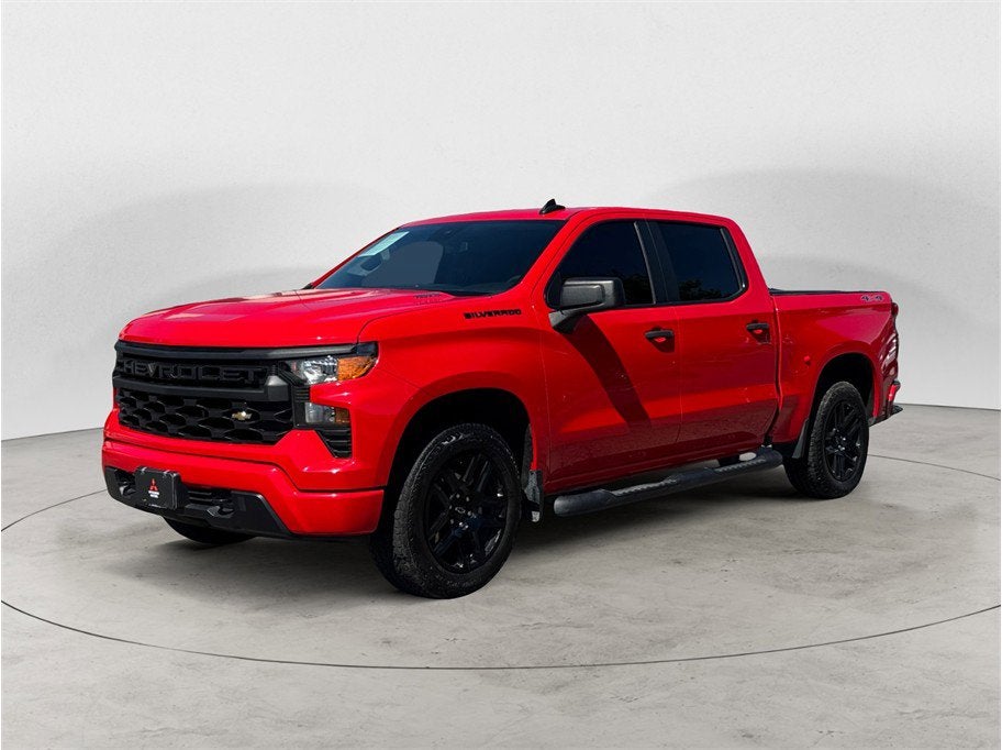 2024 Chevrolet Silverado 1500 Custom in Red Hot — front three-quarter view