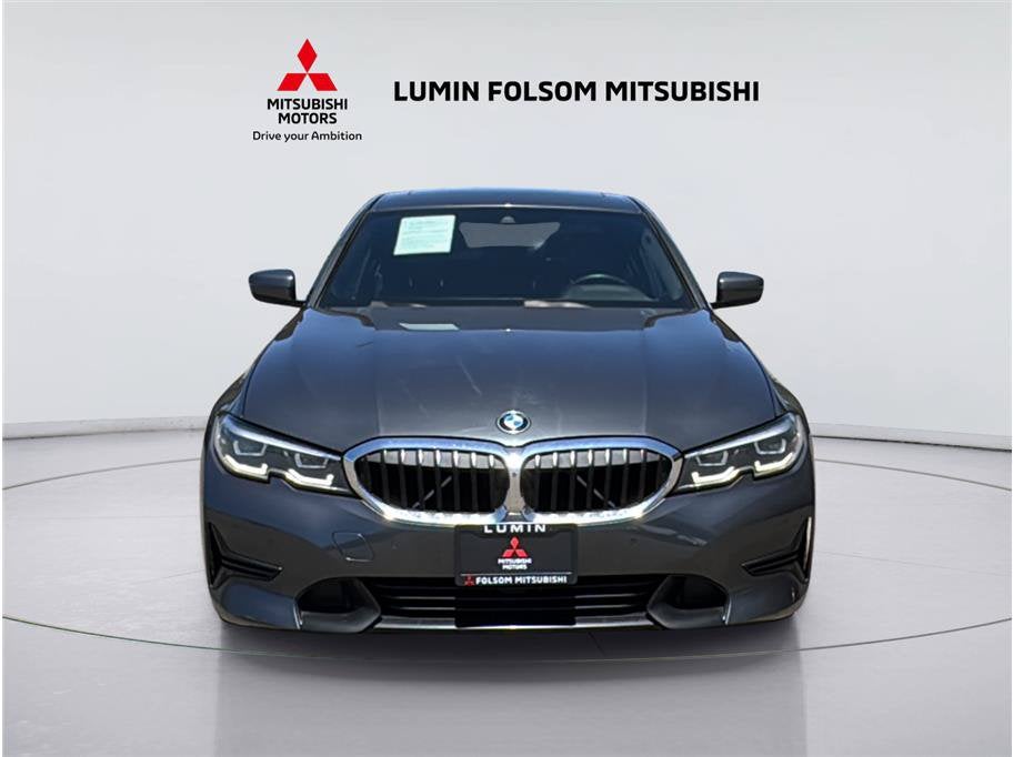 2021 BMW 3 Series 330i in Mineral Gray Metallic — front three-quarter view