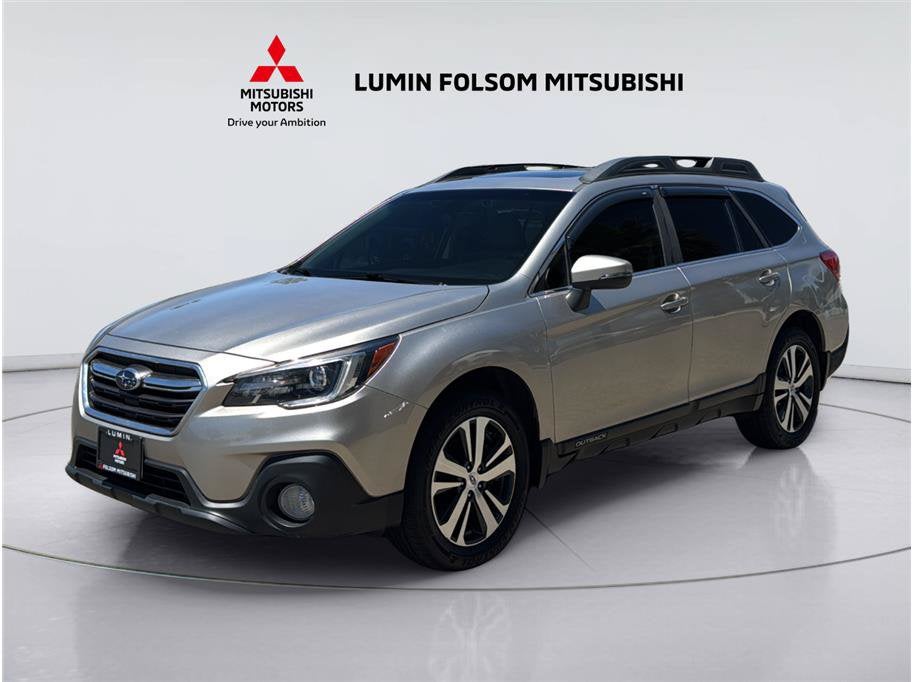 2019 Subaru Outback Limited in Tungsten Metallic — front three-quarter view